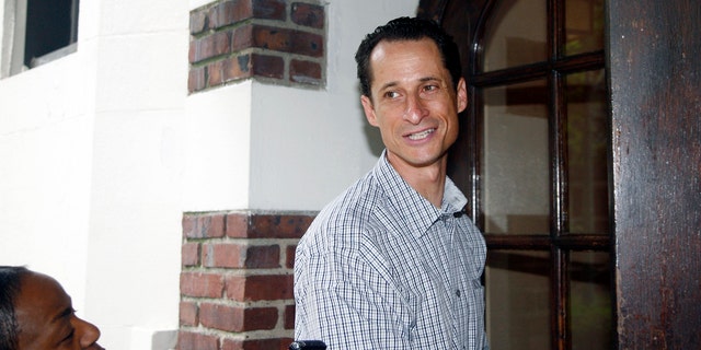 Saturday: Rep. Anthony Weiner, D-N.Y., enters his home in New York after running errands in his neighborhood.