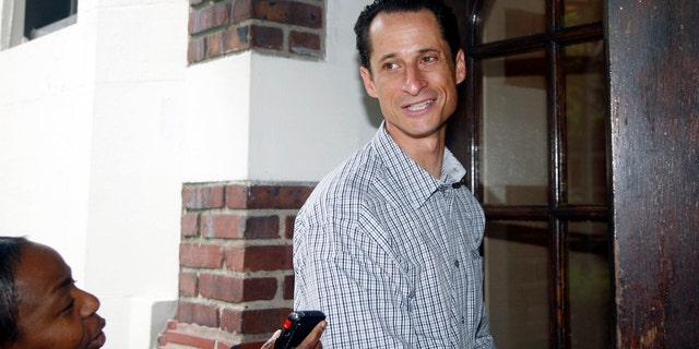 Saturday: Rep. Anthony Weiner, D-N.Y., enters his home in New York after running errands in his neighborhood.