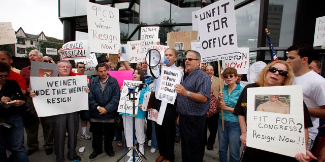 June 12: Queens residents hold a rally calling for the resignation of US Congressman Anthony Weiner D-NY while the Congressman is presumed to be in a rehab facility.