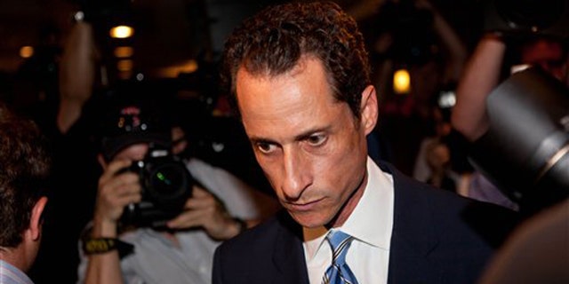 Rep. Anthony Weiner leaves a news conference in New York June 6 where he confessed that he tweeted a bulging-underpants photo of himself to a young woman.