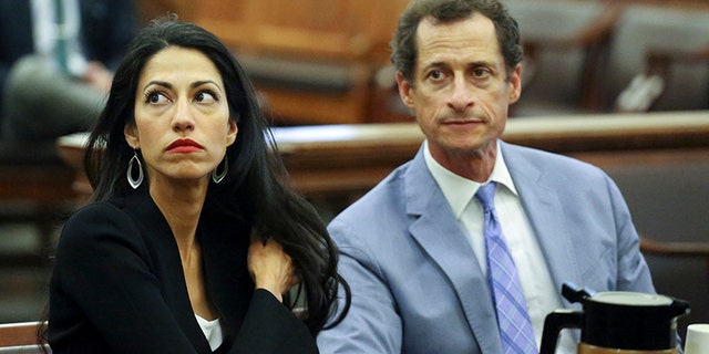 Anthony Weiner, right, and Huma Abedin are seen in court, Wednesday, Sept. 13, 2017 in New York. The couple appeared before a New York City judge to ask for privacy in their divorce case. (Jefferson Siegel/The Daily News via AP, Pool)
