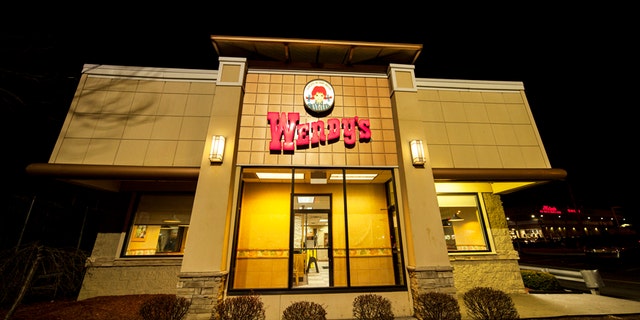 New York City, NY, USA - December 17, 2014: View of Wendy's fast food restaurant in Rego Park / Forest Hills, Queens. On Metropolitan Ave.