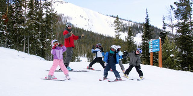 Take the kids to ski school at Big Sky Resort.