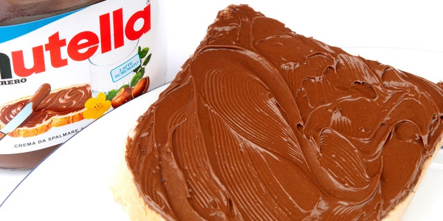 "SIENA, ITALY - April 22, 2012: Product shot of a container of Nutella hazelnut and cocoa spread."