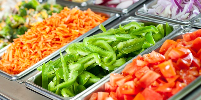 Selective-focus image of a fresh salad bar.