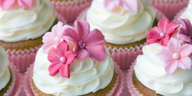 Wedding cupcakes decorated in different shades of pink