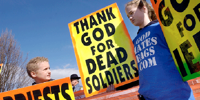 A federal judge on Monday struck down Missouri laws targeting funeral protests like this 2006 protest by the Westboro Baptist Church at a marine's funeral in Maryland.