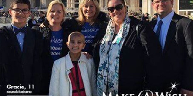 This photo shows the West family outside of the Vatican where Grace met the Pope.