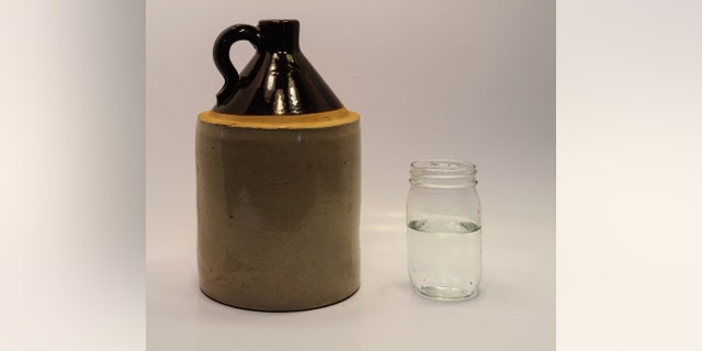 Moonshine jug and mason jar