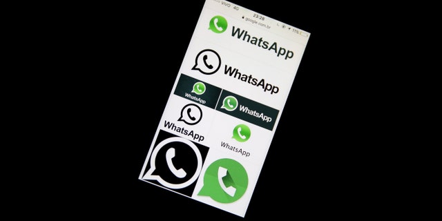 File photo - An illustration photo shows Whatsapp App logos on a mobile phone in Sao Paulo, Brazil, Dec. 16, 2015. (REUTERS/Nacho Doce/File Photo)