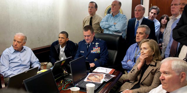 May 1, 2011: Secretary of State Hillary Rodham Clinton, President Barack Obama and Vice President Joe Biden, along with with members of the national security team, receive an update on the mission against Usama bin Laden in the Situation Room of the White House.