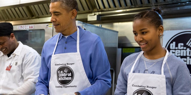 Monday, Jan. 20, 2014: President Obama and his daughter Sasha, right, make burritos at DC Central Kitchen as part of a service project in honor of Martin Luther King, Jr. Day.