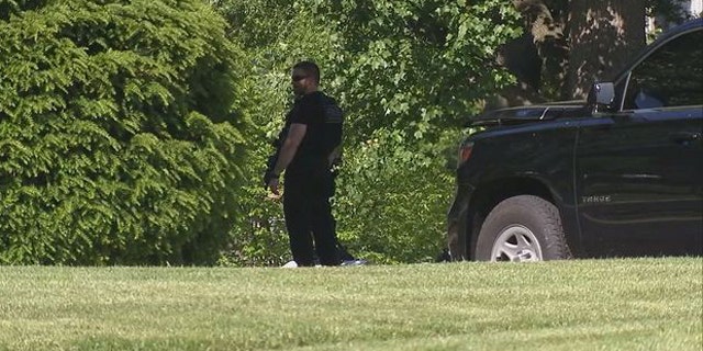 A Secret Service officer patrols the White House grounds, Tuesday, May 16, 2017 in Washington.