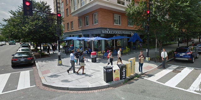 A man allegedly impersonating a cop at a Washington, D.C.-area Whole Foods slapped handcuffs on a real cop trying to arrest him.