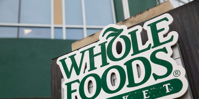 A Whole Foods store fired a security team that banned a 70-year-old customer. Photo by Kristoffer Tripplaar (Sipa via AP Images)
