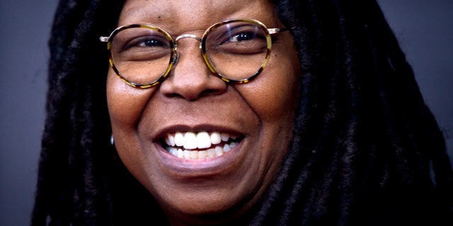 TV personality Whoopi Goldberg arrives for the premiere of "The Imitation Game" in New York, November 17, 2014. REUTERS/Carlo Allegri (UNITED STATES - Tags: ENTERTAINMENT) - RTR4EI9T