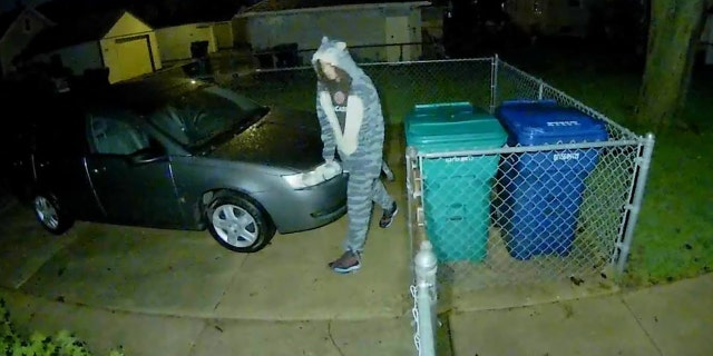 The man in a cat onesie allegedly burglarized cars and garages.