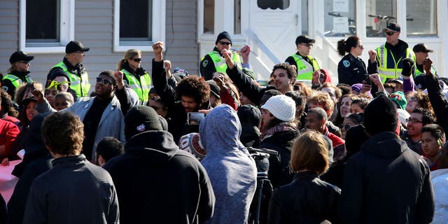 March 7, 2015: People gather during a rally protesting the shooting death of Tony Robinson.
