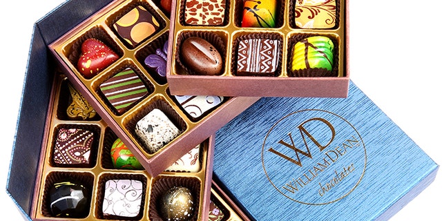 Boxes of assorted handmade chocolates.