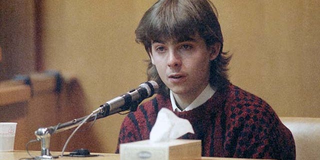 In this March 13, 1991 file photo, William Flynn, testifies on his 17th birthday how he shot Gregory Smart in the head and killed him, in court in Exeter, N.H.