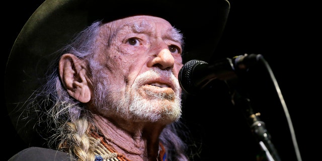 Willie Nelson, here in a January 2017 photo, keeps up a rigorous touring and recording schedule. He is 84 years old.