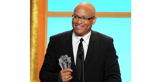 FILE: June 10, 2013: Larry Wilmore accepts the best talk show award for "The Daily Show with Jon Stewart" at the Critics' Choice Television Awards in the Beverly Hilton Hotel in Beverly Hills, Calif.