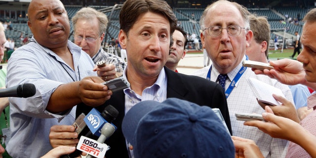 FILE: Jeff Wilpon speaks to members of the media on the field before the Mets' game against the Colorado Rockies at Citi Field in New York.