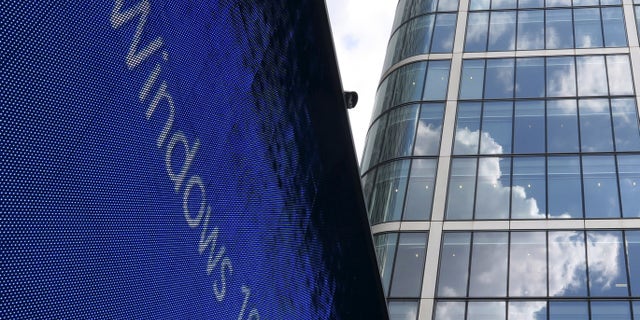 An advertisement for Windows 10 is seen in London's Canary Wharf financial district July 29, 2015.