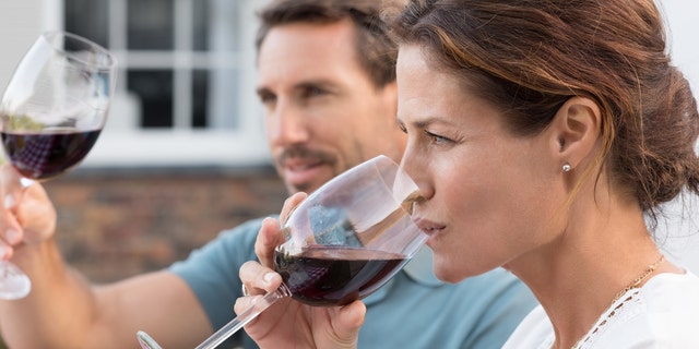 wine drinking red wine couple drinking wine istock medium