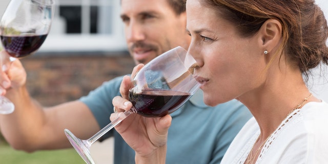 wine drinking red wine couple drinking wine istock medium