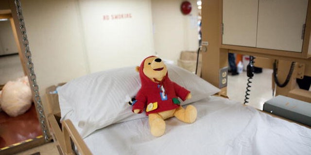 PORT-AU-PRINCE, HAITI - JANUARY 21: A Winnie the Pooh doll awaits patients in the pediatric ward on board the USNS Comfort, a U.S. Naval hospital ship, on January 21, 2010 in Port-au-Prince, Haiti. The Comfort deployed from Baltimore with 550 medical personnel on board to treat victims of Haiti's recent earthquake, and arrived on January 20. (Photo by Brendan Hoffman/Getty Images)