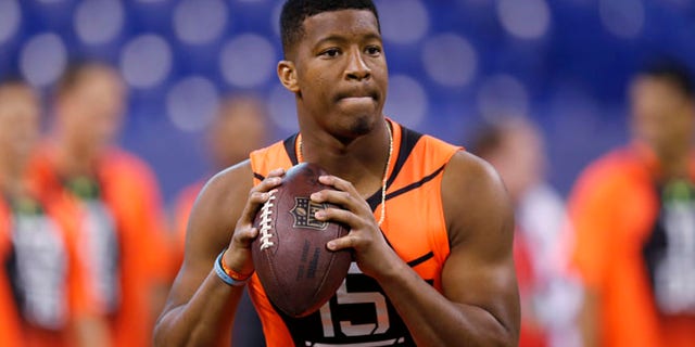Feb. 21, 2015: Florida State quarterback Jameis Winston runs a drill at the NFL football scouting combine in Indianapolis. (AP)