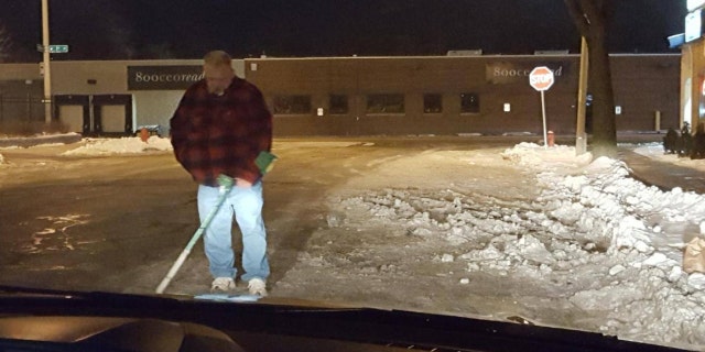 Milwaukee Police Officer Jason Schneider and his father, seen in the picture, used metal detectors to find a woman's wedding ring.