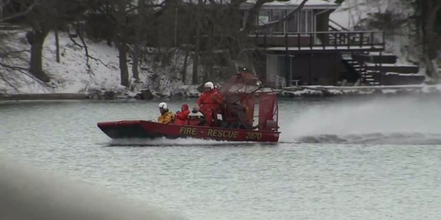 Jan. 3, 2016: A search crew looks for two missing men on Lake Beulah, in East Troy, Wis. The bodies of two other men were pulled from the lake Sunday. (WITI)