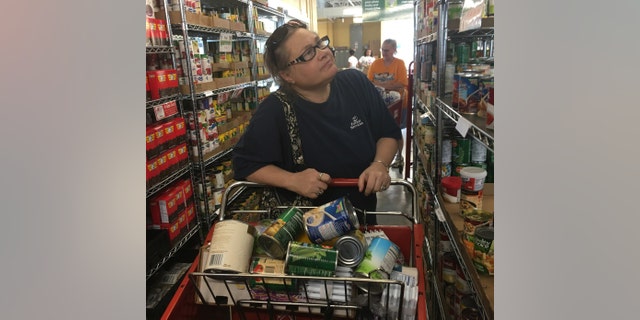 In this photo provided by Adam Allington, taken June 18, 2016, shows Margaret Anderson. During their working years, women tend to earn less than men, and when they retire, they're more likely to live in poverty. (Adam Allington via AP)