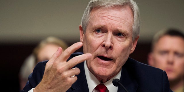 Navy Secretary Ray Mabus Jr. gestures while testifying on Capitol Hill in Washington, Tuesday, Feb. 2, 2016, before the Senate Armed Services Committee hearing to examine the implementation of the decision to open all ground combat units to women. (AP Photo/Cliff Owen)