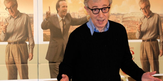 U.S. director Woody Allen gestures during a photocall for the film" To Rome with Love" in Rome, April 13, 2012. REUTERS/Stefano Rellandini (ITALY - Tags: ENTERTAINMENT) - RTR30O6H