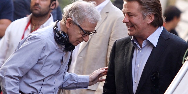 Alec Baldwin (right) has defended Woody Allen against Dylan Farrow's claims and said in January he would continue to make films with the director.