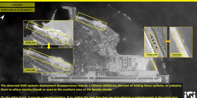 New images show China apparently removed surface-to-air missile systems from the contested islands in the South China Sea.
