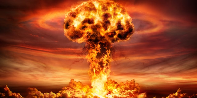 Nuclear Explosion With Orange Mushroom Cloud (This content is subject to copyright.) (Credit: iStock)