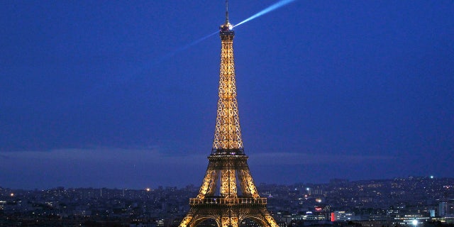 Eiffel Tower lit up at night