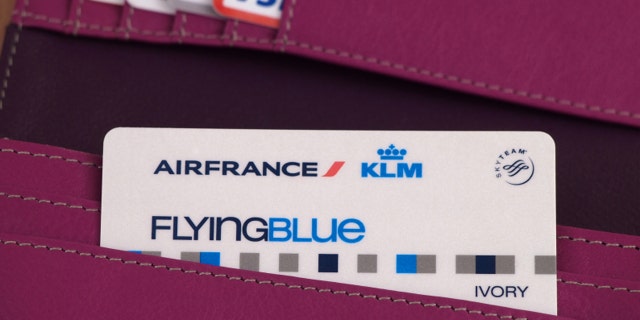 ZAGREB, CROATIA - MARCH 2, 2015: Photo of Air France - KLM card and other cards in wallet. Flying Blue, the frequent flyer program of Air France - KLM, awards members points based on miles travelled and class of service.