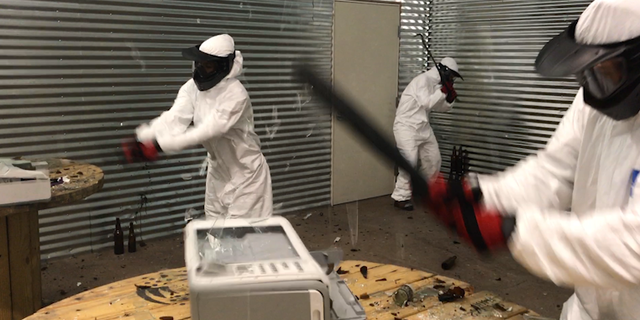 Participants smash a number of different items in the Vegas Wreck Room.