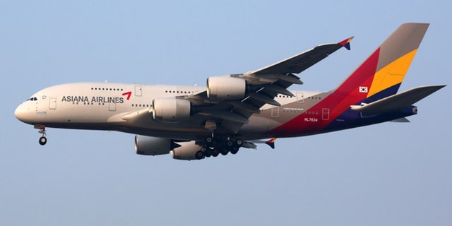 Incheon, South Korea - May 24, 2016: An Asiana Airlines Airbus A380 with the registration HL7634 approaching Seoul Incheon International Airport (ICN) in South Korea. The Airbus A380 is the world's largest passenger airliner. Asiana Airlines is an airline from South Korea with its headquarters in Seoul.