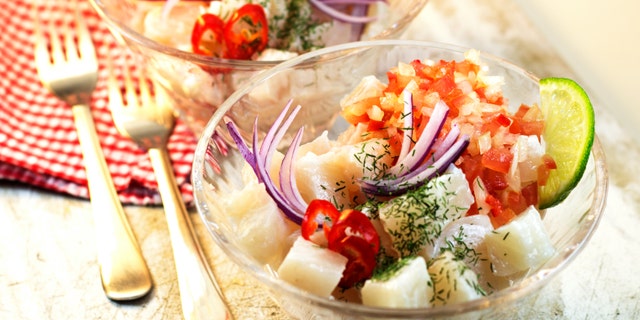 Peruvian food Ceviche. Raw fish marinated on lime juice.