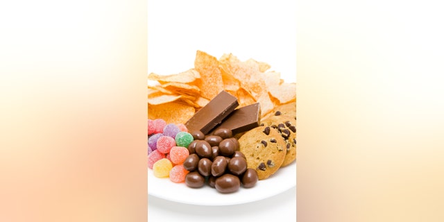 junkfood on plate isolated on white