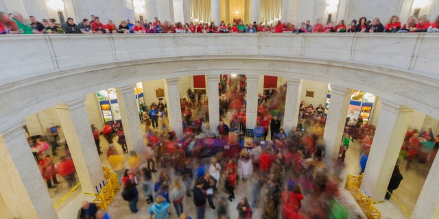 Thousands of teachers and school personnel fill the Capitol rotunda in Charleston, W.V., on Monday, March 5, 2018.