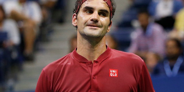 SEPT. 3: Roger Federer, of Switzerland, reacts after losing a point to John Millman, of Australia, during the fourth round of the U.S. Open tennis tournament.