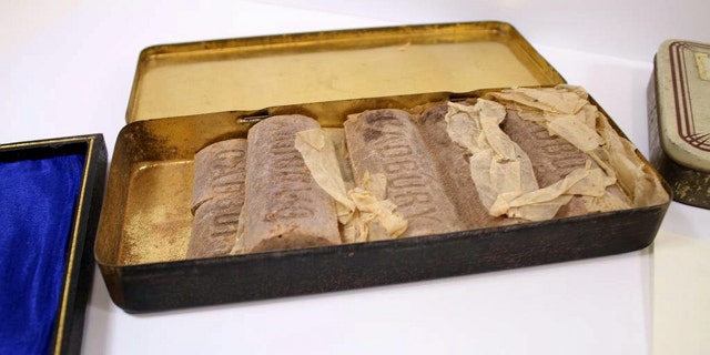 An auctioneer said that the tin itself is rare, but "to find the chocolate still inside is unreal."