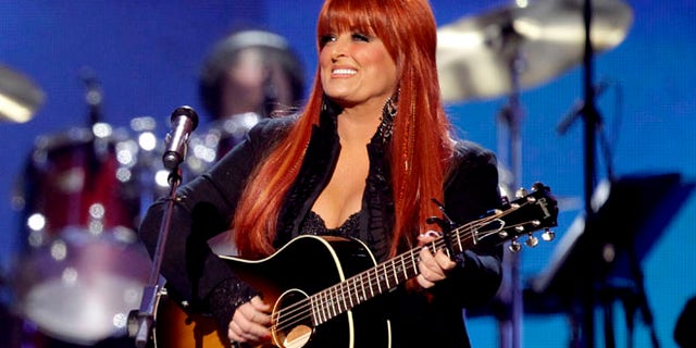 This April 4, 2011 file photo shows country winger Wynonna Judd from The Judds, performing at the Girls' Night Out: Superstar Women of Country in Las Vegas.
